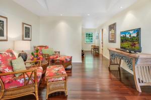 Et opholdsområde på Ohia Kona Estates - An All Suites B&B