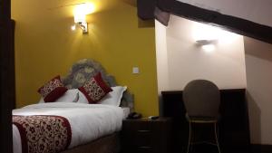Letto o letti in una camera di Hotel Heranya
