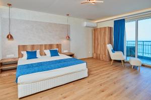 Postel nebo postele na pokoji v ubytování Family Hotel Regata