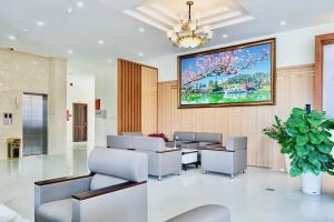 TV a/nebo společenská místnost v ubytování Bombo DaLat Hotel