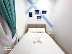 Postel nebo postele na pokoji v ubytování D'Pristine締金城-新山樂高樂園旁-特色主題房 冰雪奇緣 皮卡丘 角落生物 懶懶熊