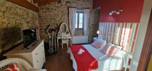 TV a/nebo společenská místnost v ubytování Apartamentos Casa Bárbora - AR-720-AS