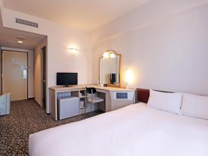 Postel nebo postele na pokoji v ubytování Chisun Hotel Yokohama Isezakicho + 28 fotografií
