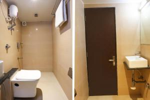 two pictures of a bathroom with a toilet and a sink at FabHotel West Inn in Mumbai