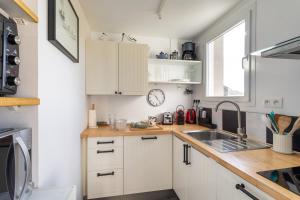 Dapur atau dapur kecil di Jardin sur l'eau - Appt vue mer