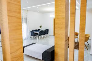 Ένα ή περισσότερα κρεβάτια σε δωμάτιο στο Villetta di lusso in Tunisia