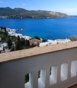 a view of the ocean from a balcony at Panorama Appartment in Agia Marina