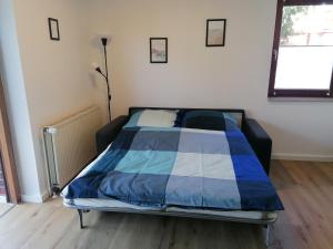 Postel nebo postele na pokoji v ubytování Dünenzelt