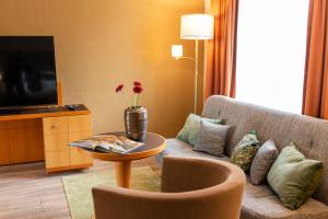 TV a/nebo společenská místnost v ubytování Parkhotel Görlitz