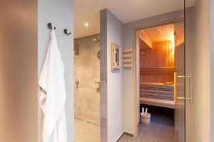 Phòng tắm tại Vienna House Easy by Wyndham Bremen