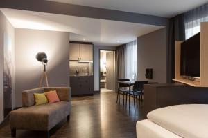 Zona de estar de Vienna House Easy by Wyndham Bremen City Apartments