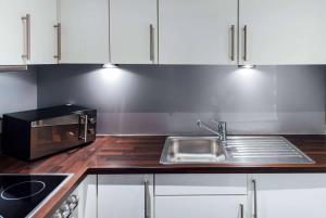 Kuchyň nebo kuchyňský kout v ubytování Vienna House Easy by Wyndham Stuttgart
