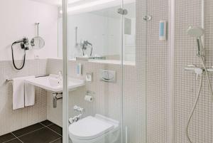 Koupelna v ubytování Vienna House Easy by Wyndham Stuttgart