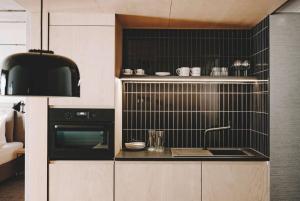A cozinha ou cozinha compacta de Vienna House by Wyndham Mokotow Warsaw