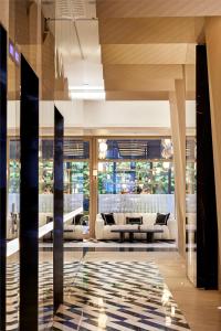 a lobby with a couch and a table at Vakko Hotel and Residence in Istanbul