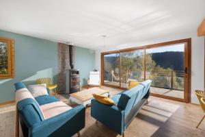 Część wypoczynkowa w obiekcie Le Cerf, chalet cocooning avec piscine et billard