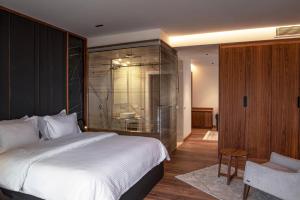 Postel nebo postele na pokoji v ubytování Hotel Trofta