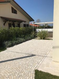 A garden outside Home by Massi