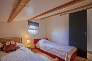 מיטה או מיטות בחדר ב-Cote Conca Oro