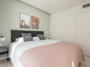 Posteľ alebo postele v izbe v ubytovaní limehome Barcelona Rector Triadó
