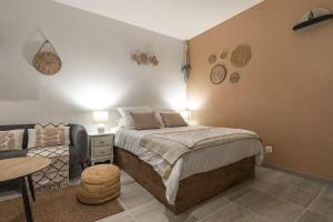 Posteľ alebo postele v izbe v ubytovaní Studio « le Bohème chic »