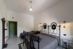 Letto o letti in una camera di San Leo Albergo Diffuso
