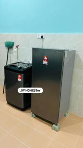 a new homes tax machine in a room at IJW HOMESTAY in Kuala Terengganu