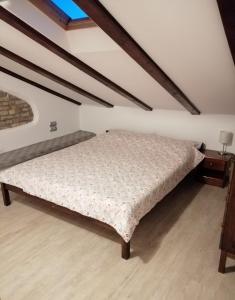 a bed in the attic of a room at Apartment Terassin in Koper