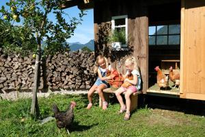 A garden outside Das Lenz by Inncomer