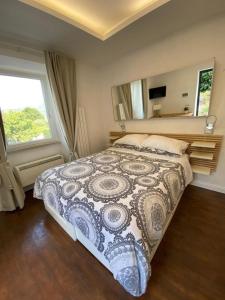 Een bed of bedden in een kamer bij La Casa con il Bosco