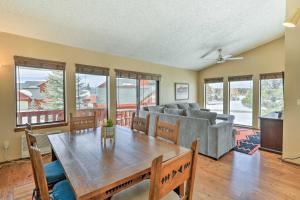 a living room with a table and a couch at Pagosa Springs Vacation Rental with Boat Dock! in Pagosa Springs