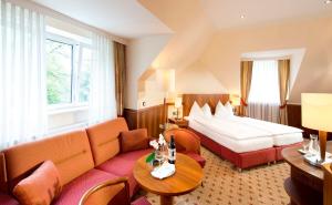 Postel nebo postele na pokoji v ubytování EurothermenResort Bad Hall - Hotel Miraverde