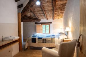 Postel nebo postele na pokoji v ubytování Casa Rural Mas Garganta