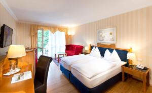 Postel nebo postele na pokoji v ubytování EurothermenResort Bad Hall - Hotel Miraverde