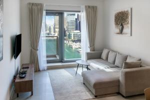 Posezení v ubytování FAM Living - Sparkle Towers 1B - Marvelous Marina Views