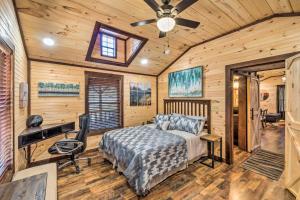 a bedroom with a bed and a desk at Somerset Cabin, Close to Lake Access! in Somerset