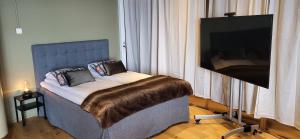 Giường trong phòng chung tại Åre Torg Hotell