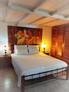 Ένα ή περισσότερα κρεβάτια σε δωμάτιο στο Violeta's Seaview Apartment in Rhodes