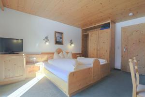 Postel nebo postele na pokoji v ubytování Ausserwieserhof