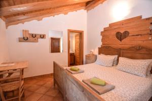 Postel nebo postele na pokoji v ubytování Agritur Airone Bed & Camping