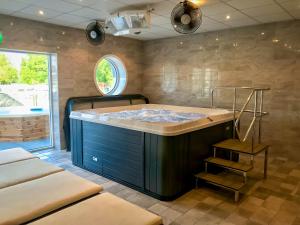 Postel nebo postele na pokoji v ubytování Ursand Resort & Camping + 36 fotografií