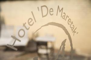 Certifikát, hodnocení, plakát nebo jiný dokument vystavený v ubytování Hotel De Maretak