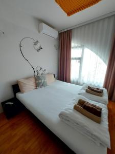 Voodi või voodid majutusasutuse The Bulevard Hotel toas