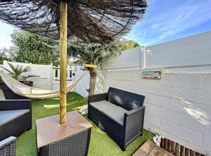 Posedenie v ubytovaní Rez de jardin à 900m de la plage
