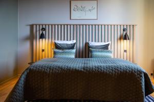 Letto o letti in una camera di Hotel Britannia