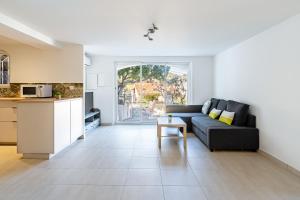 Kuchyňa alebo kuchynka v ubytovaní Bas de villa refait à neuf, climatisation et terrasse vue mer + 9 fotografií
