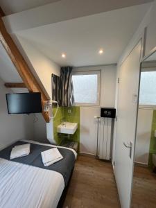 Kuchyň nebo kuchyňský kout v ubytování MAX Hotel Amsterdam