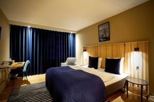 Letto o letti in una camera di Hotel Britannia