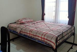 Een bed of bedden in een kamer bij Villa 88