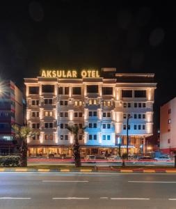 a night view of a building with lights on at Aksular Hotel in Trabzon